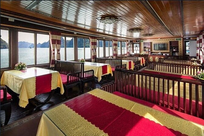 Halong bay 4 hours boat tour from Halong city with 2 caves, kayak - Your private classic wooden boat: comfort that’s easy to live with