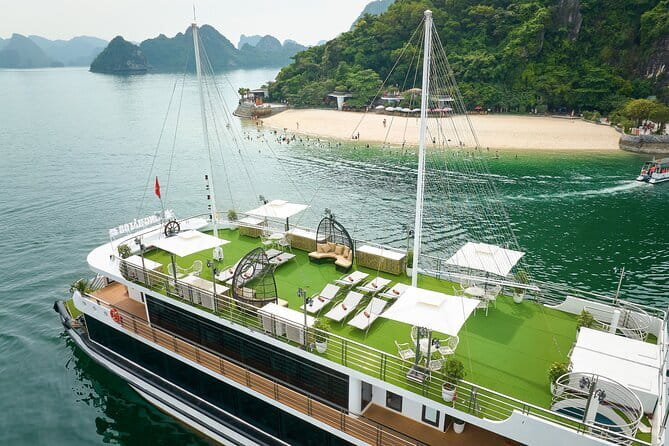 Halong Bay 5-Star Day Cruise, Buffet Lunch, Cave, Kayak, Transfer - Ti Top Island: viewpoint hike plus beach break in one hour