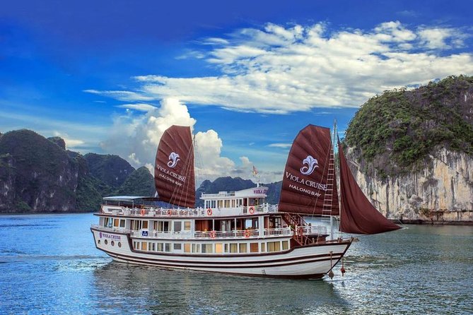 Halong Bay Cruises 2Day/1Night 5 Star Pick up & Transfer Included - Day 2 Morning: Tai Chi, Breakfast, and Thien Canh Son Cave
