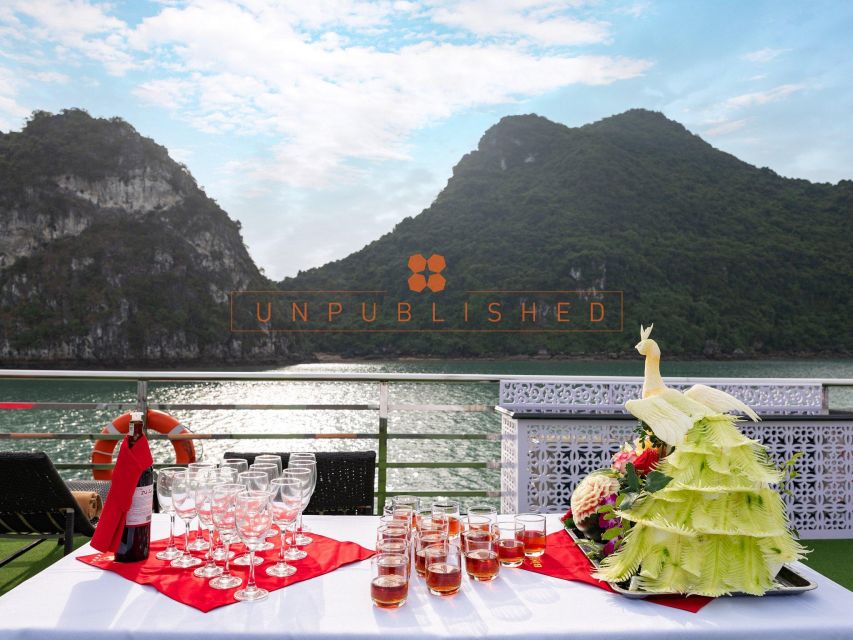 Halong Bay Delights: Deluxe Day Cruise with Kayaking & Lunch - Titov Island: Swim, Hike, or Jacuzzi Wind-Down
