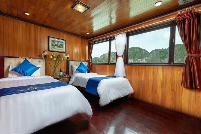 Halong bay deluxe cruise 2 days/ 1 night: kayaking, titop island, surprise cave - Day 1: tender to the cruise, safety briefing, and the first meal on board