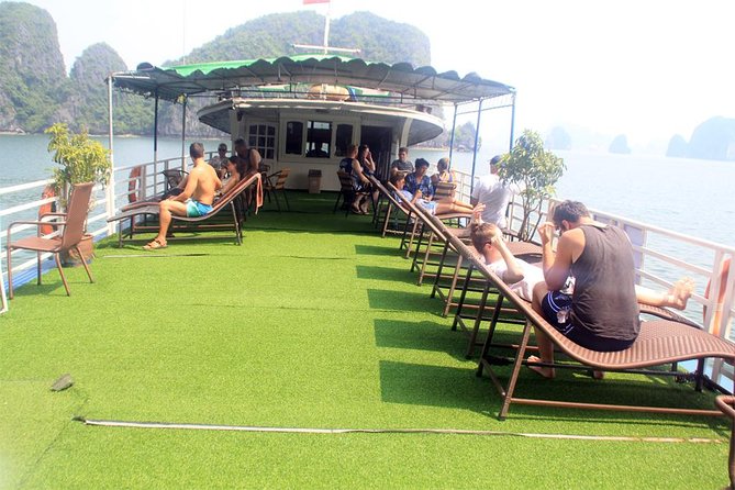 Halong bay full day trip: Visit Surprise cave, Titop island, kayaking & swimming - Luon Cave access: kayak vs bamboo boat (and how to choose)