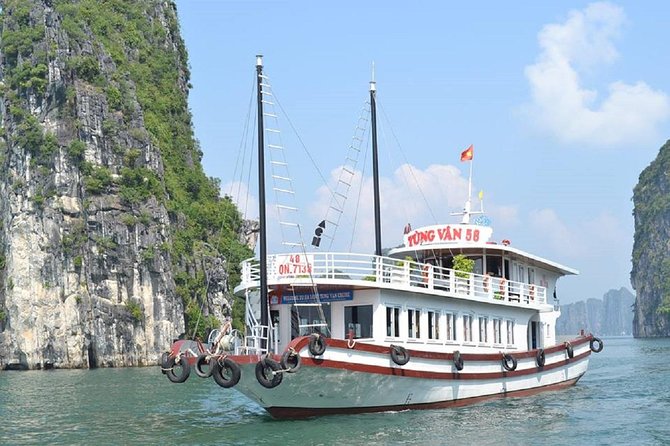 Halong Bay Islands and Caves: Full-Day Tour from Hanoi - Floating Village bamboo boat ride: slower water, better photos