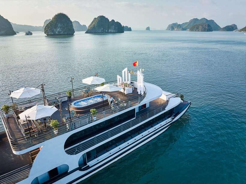 Halong Bay: Luxury Day Cruise with Buffet, Kayak, Swim - The First Big Stop: Surprising Cave and Its Photo Moment