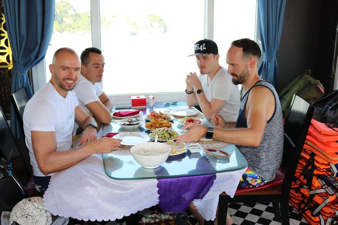 Halong Day Tour: Islands, Cave, Kayak. Lunch. Transfers - Guide and group size: how the day stays organized