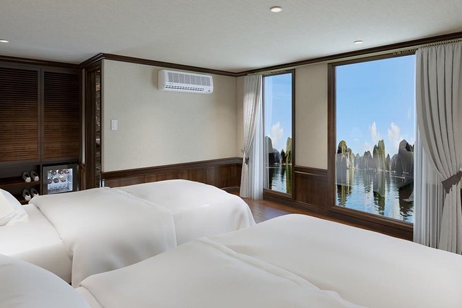 Halong Luxury Cruise 2D/1N: Kayaking, swimming, Surprise cave, Titop island - Onboard food and activities: spring rolls, BBQ, squid fishing, and spa time