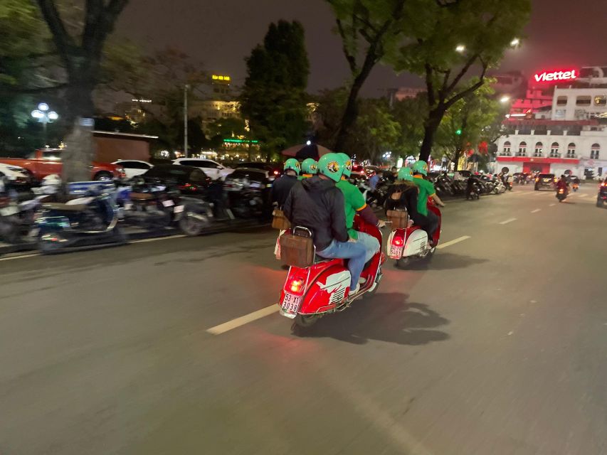 Hanoi 4.5-Hour Vespa Tour city tour - The Train Street segment: life inches from the rails