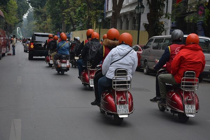 Hanoi Back Streets Vespa Tours: Hanoi Insider Vintage Vespa Tour - Dường Tau (Reunification train track): trains and houses side-by-side