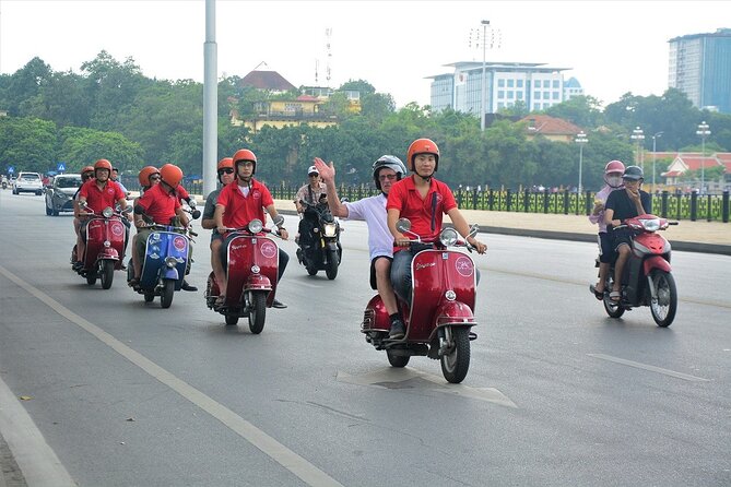 Hanoi Back Streets Vespa Tours: Hanoi Vintage Vespa Tours City - Getting on the scooter: safety briefing, pickup, and small-group flow