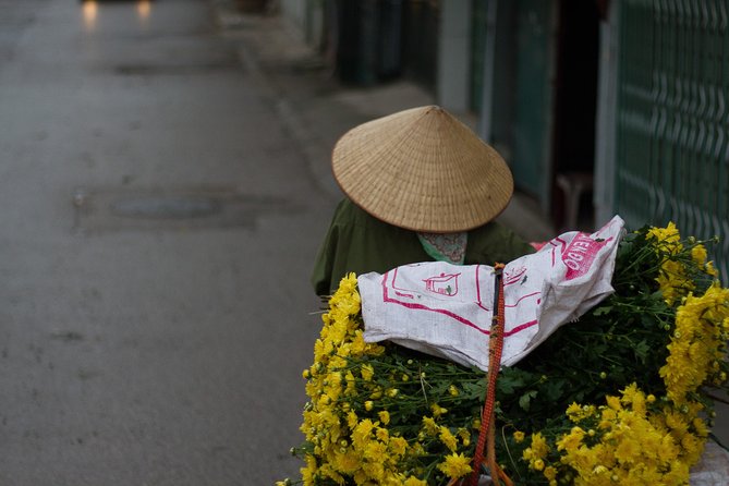 Hanoi by dawn Photo Tour - Long Bien Market: motion, light bulbs, and cargo in motion