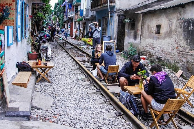Hanoi City Half Day Private Tour: Hidden Corners & Train Street - Dong Xuan Market and Long Bien Bridge: real Hanoi, not just landmark Hanoi