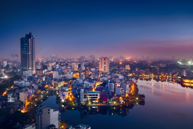 Hanoi City Motorbike Tour with Banana Island and Local Food - Hanoi Opera House: a quick stop that helps you read the city