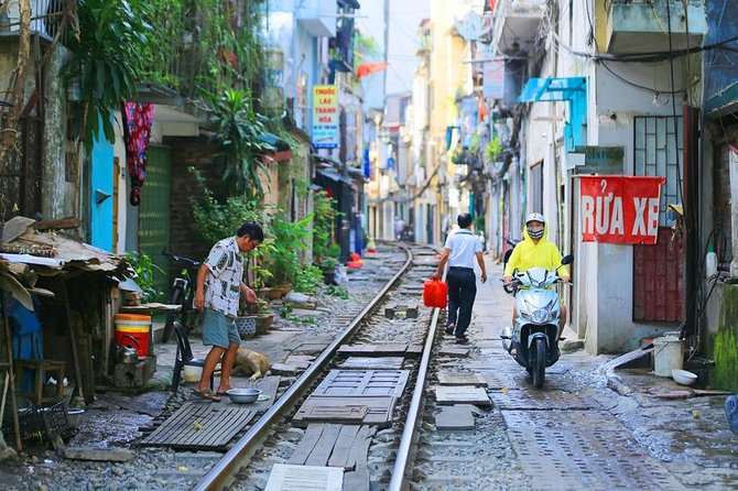 Hanoi city tour and drinking beside railway- group tour - Morning start at Thang Long Water Puppet Theatre (and why it matters)