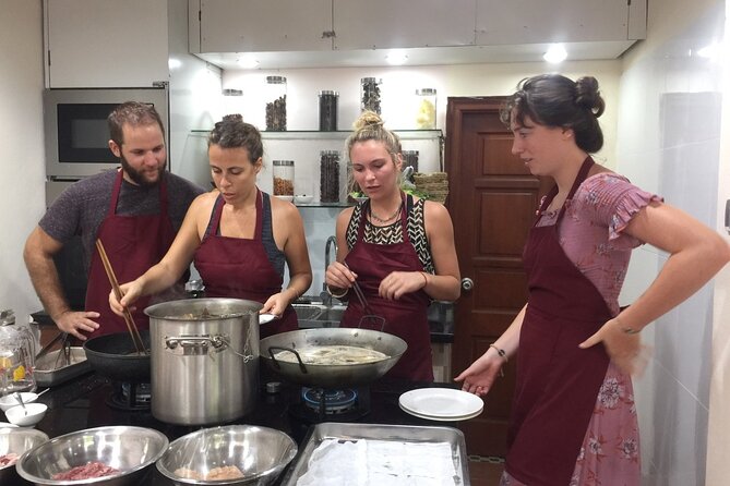 Hanoi Cooking Class and Market Tour in Ancient House - Hanoi beer, herbal welcome drinks, and wine with your meal