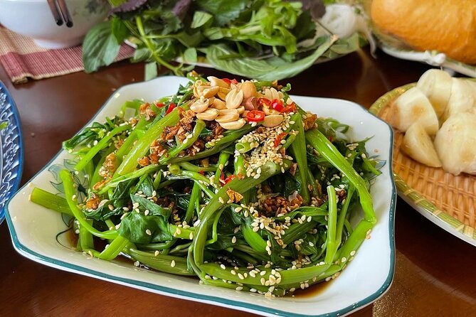 Hanoi Cooking Class Learning 5 Dishes including Banh Xeo - Guides like Bella, May, and Vy make or break a class