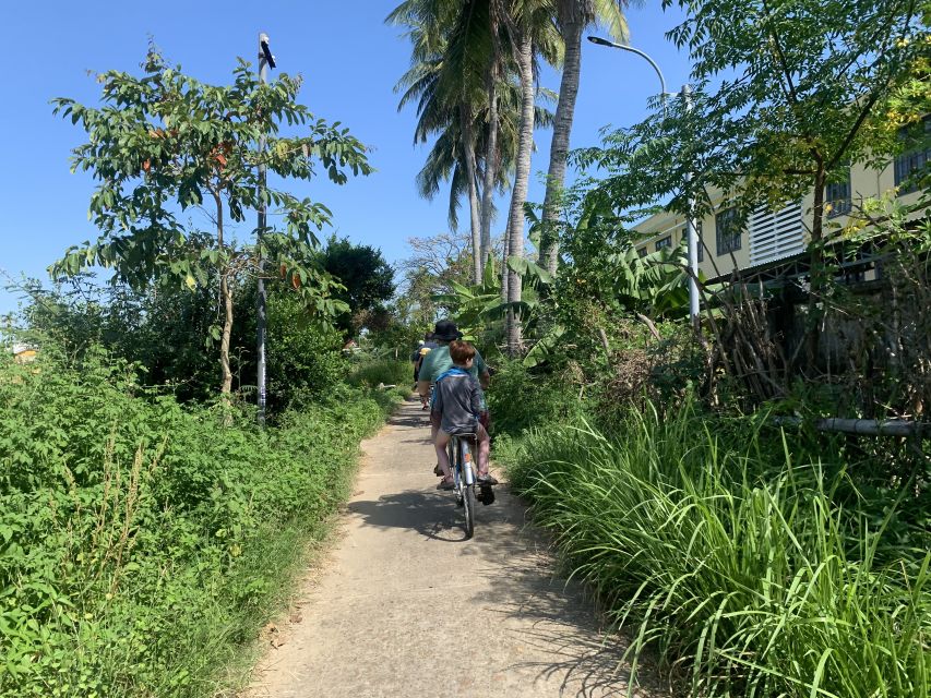 Hanoi Countryside Bike Tour: Red River Culture & Daily Life - Village gate, history lessons, and the feeling of place