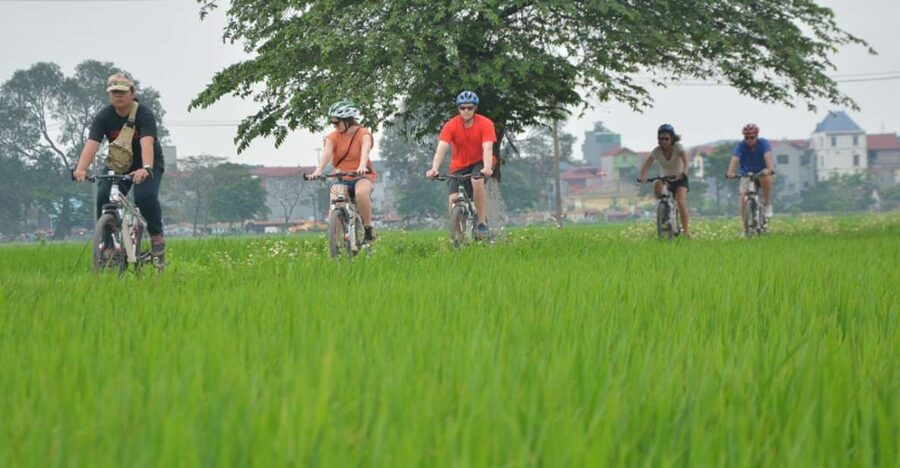 Hanoi Countryside Bike Tour: Red River Culture & Daily Life - Old Quarter pickup, helmets on, and the 35 km reality check