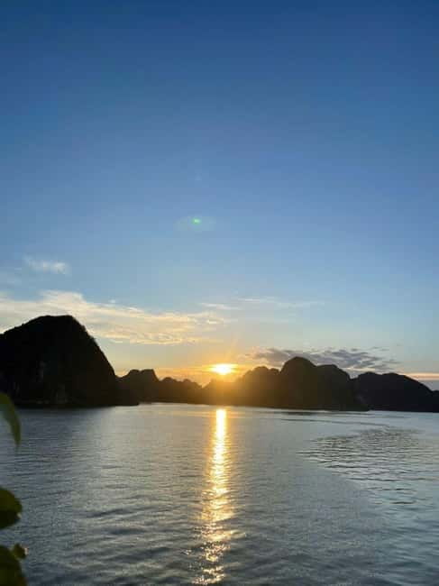 Hanoi-Ha Long 1D: Caves, Islands, Kayak, Lunch & Small Boat - Sunset Party: Red Wine, Tea, Cookies, Fruit, and a Slower Pace