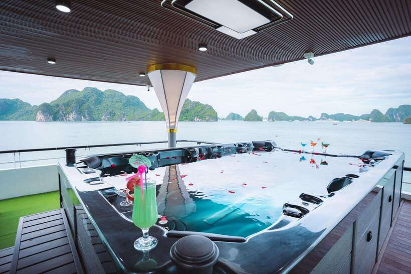 Hanoi: Ha Long Bay Day Tour - Apollo Cruise, Jacuzzi, Buffet - Arriving at Tuan Chau Harbor and stepping onto the ship
