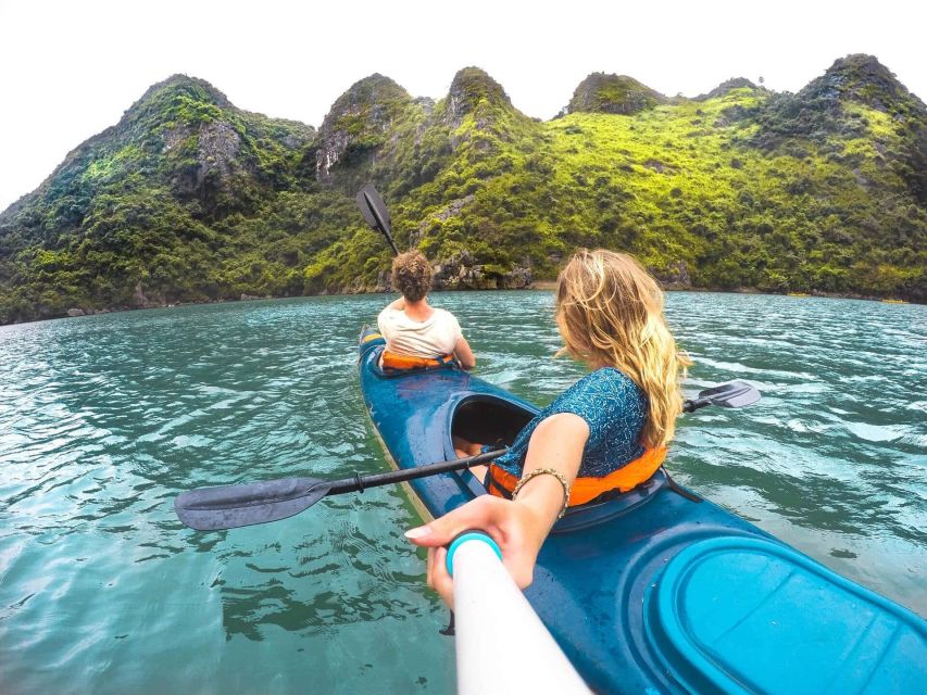 Hanoi: Halong Bay Day Trip with Titop Island, Cave, & Kayak - Luon Cove kayaking or bamboo rowing: close-up water time