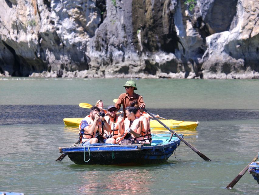Hanoi: Islands & Caves Ha Long Cruise with Lunch & Kayaking - Sailing past the named rocks: Fighting Cock and Incense Burner from the deck