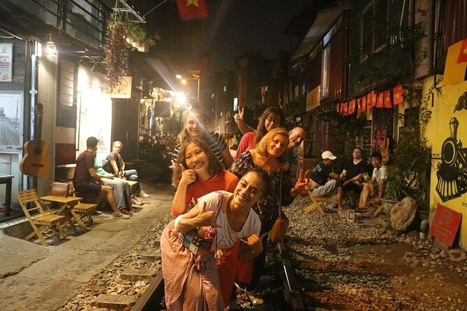 Hanoi Jeep By Night Street Food Tour and Train Street Experience - Stop 4: Duong Tau lake rides and the Train Street moment