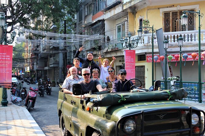 Hanoi Jeep Food Tours Led By Women - Passing the Ho Chi Minh memorial at night: reverence with movement