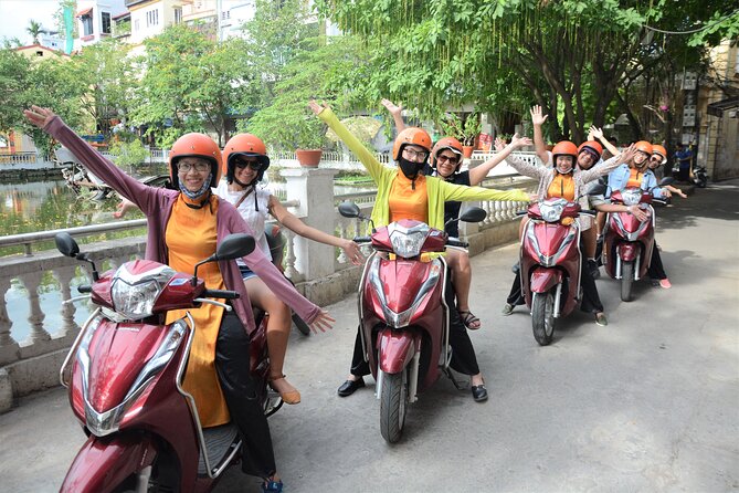 Hanoi Motorbike Tour Led By Women - City And Countryside Full Day - Long Bien Bridge: morning crossings and a tea stop with bonsai gardens