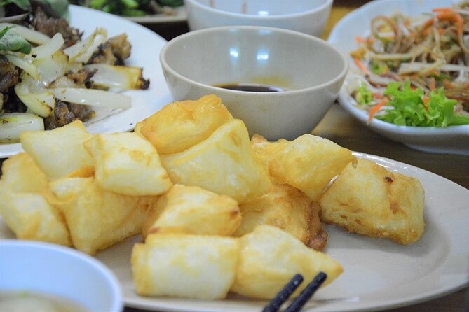 Hanoi Motorbike Tour Led By Women - City And Countryside Full Day - Co Loa Citadel and Lotus Lake: wet market fruit + a calm break