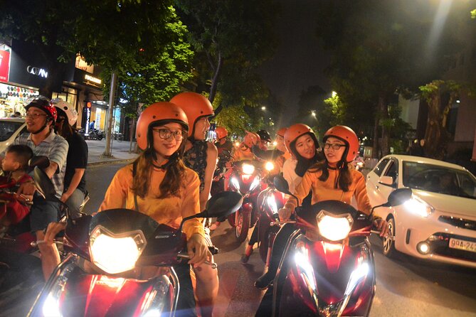 Hanoi Motorbike Tour Led By Women: Hanoi Motorbike Food Tours - Stop 3: Hồ Trúc Bạch (West Lake) for night photos and a ceremonial moment