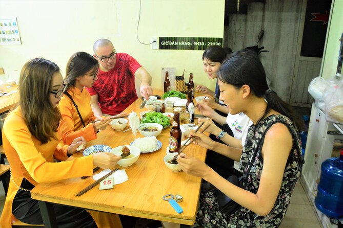 Hanoi Motorbike Tour Led By Women: Hanoi Motorbike Food Tours - Stop 4: Ngõ 224 Lê Duẩn and the lived-in train-track scenes