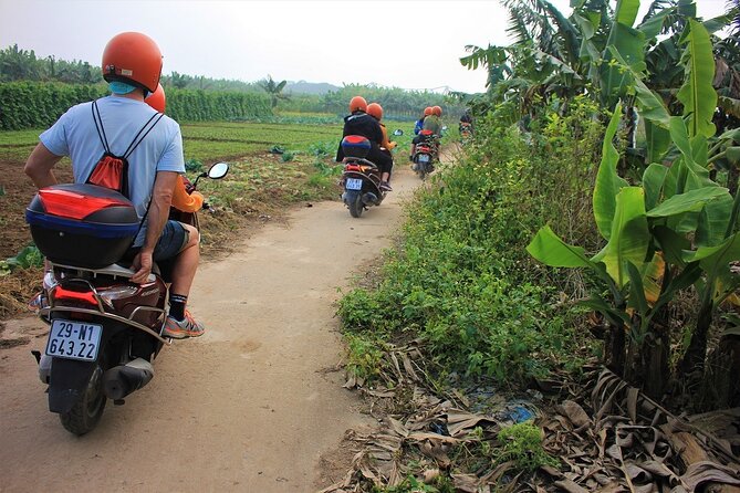 Hanoi Motorbike Tours Led By Women: Hanoi City Insight Motorbike Tours - Dường Tàu and French-era atmosphere: seeing the city’s edges