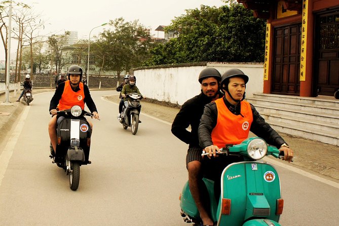 HANOI MUST SEE SITES Vespa Tour - Stop 6: Duong Tau Train Street and the Rails Still in Use