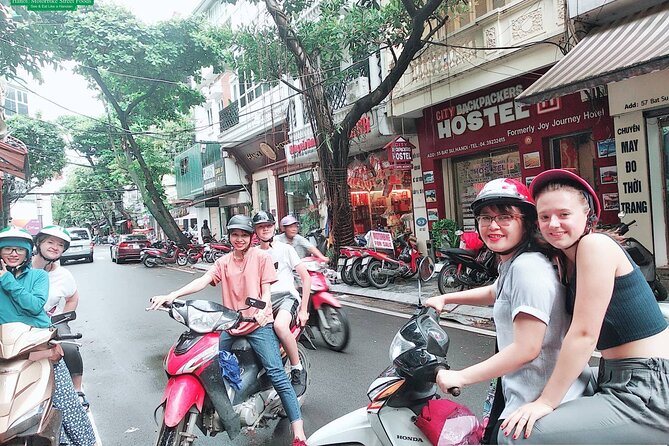 Hanoi Nightlife Food Tour By Motorbikes - Long Bien Bridge photo stops and landmark shortcuts