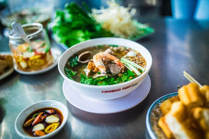 Hanoi Street Food Tour By Motorbike + Sightseeing SAFE & FUN - Train Street Cafe on Duờng Tau: why the last stop feels special