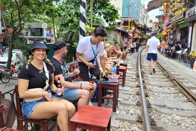 Hanoi street food walking and train street visit - Old Quarter food time: bánh cuốn and family-run plates