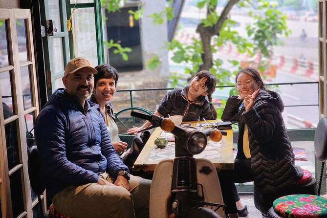 Hanoi Vespa Tours: Food + Culture + Fun on Army Vespa - Hanoi Train Street: watching a train with the right timing