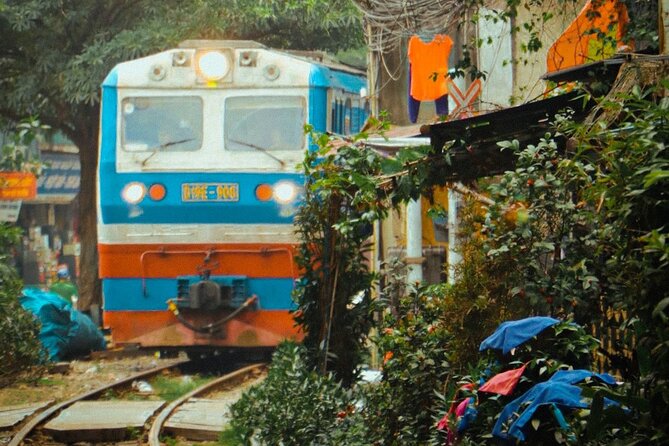 Hanoi Walking Street Food Tour with Train-Street Visit - Meeting at 38 Bat Su Street and How the Old Quarter Route Feels