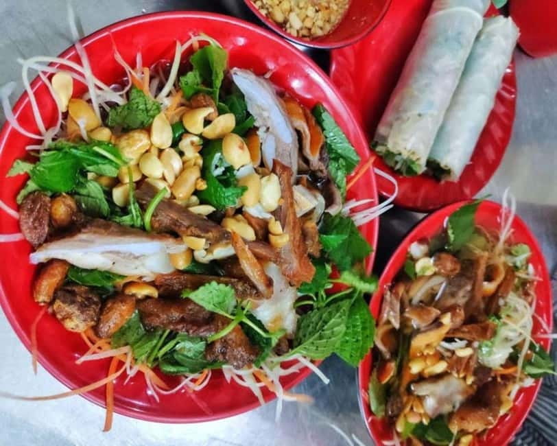 Hanoi: Walking Street Food & Train Street Culture Tour - Eating like a local: sidewalk spots and shared samples