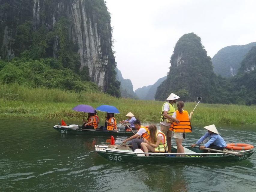 Hoa Lu and Tam Coc 1-Day Tour - Sampan through three caves: Hang Ca, Hang Hai, and Hang Ba