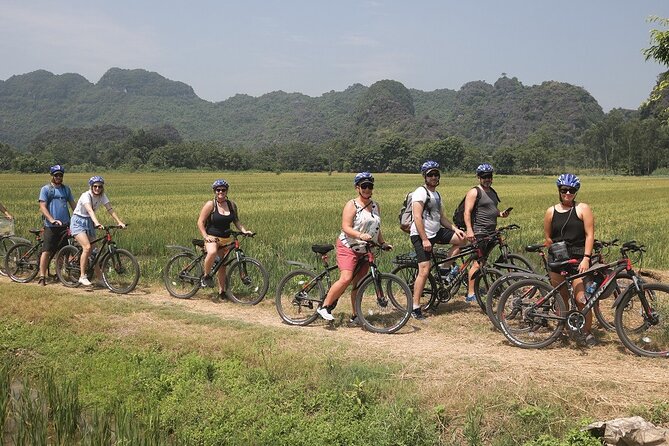 Hoa Lu - Tam Coc - Mua Cave 1 Day with Cycling, Hiking, Lunch - Getting there by modern AC bus: comfort matters for an 8-hour day