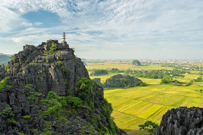 Hoa Lu -Tam Coc - Mua Cave Full Day Trip with Limousine Bus - Tam Coc and Bich Dong: Limestone Cliffs, Rice Fields, and Biking Time