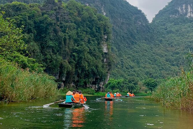 Hoa Lu, Tam Coc, Mua Cave Via Bike & Boat - Top Rated Tours 1 Day - Mua Cave at golden hour: the step climb to Ngoa Long