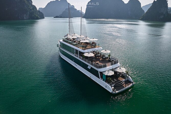 JADESAILS CRUISE-The Most Luxurious Day Tour in Ha Long Bay & Lan Ha Bay - Getting on board at Tuan Chau: welcome drink, briefing, and smart timing