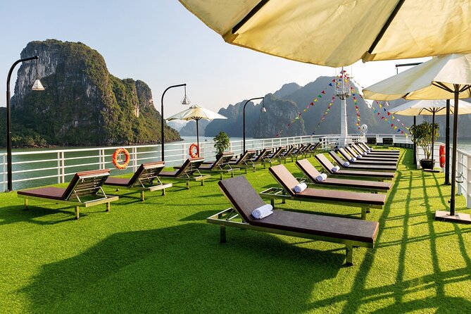 Lan Ha bay luxury cruise 2D/1N: Kayaking, jumping & swimming at pristine places - Sunset night onboard: floating-hotel views, BBQ-style dinner energy, and making friends fast