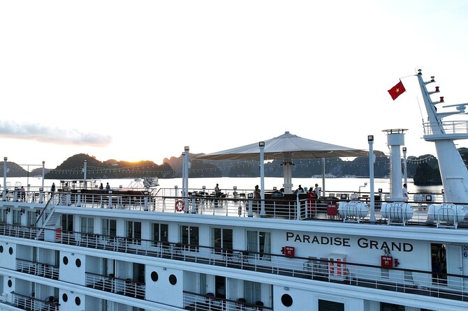 Lan Ha Bay Overnight on Paradise Grand Cruise - Sunrise on the sundeck: tai chi and pastries before the caves