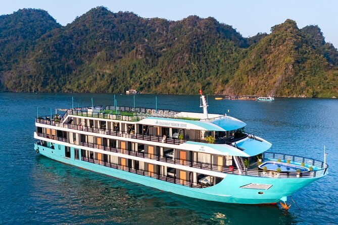 Le Theatre Cruise - Wonder on Ha Long & Lan Ha Bay 2 Days Tour - Day 2 at sunrise: Tai Chi, a cave visit, then back to Tuan Chau