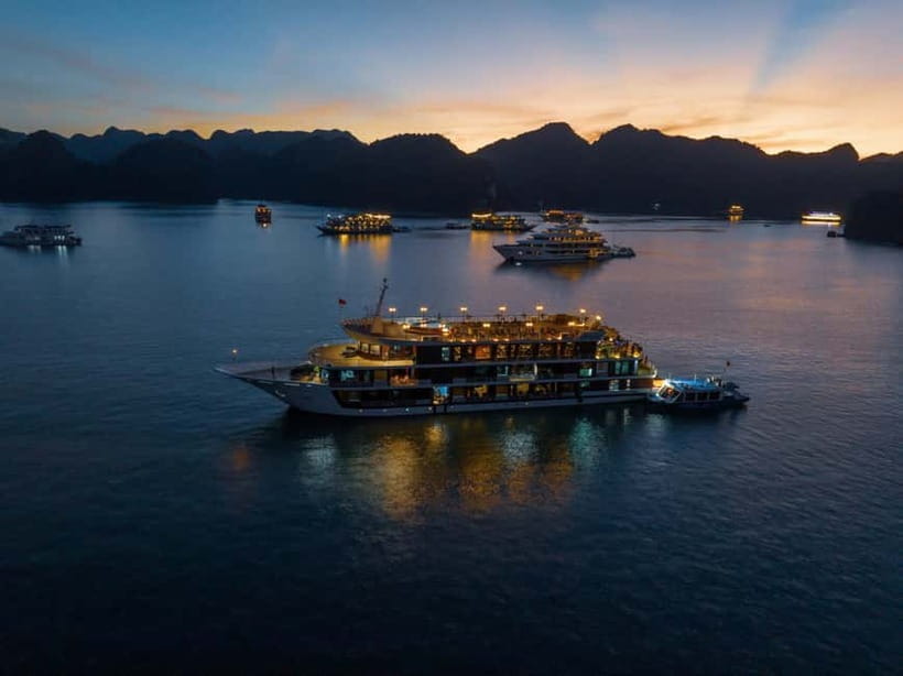 Luxury 5-Star Halong Bay Overnight Cruise: full board, kayak - Dinner and Night Activities: Karaoke and Squid Fishing