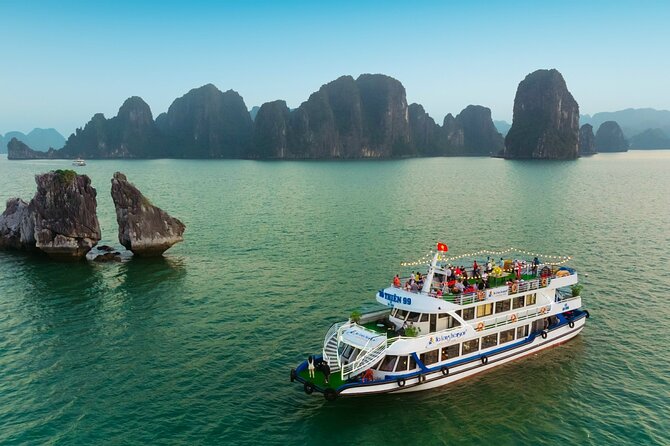 LUXURY Halong Bay Cruise 5 Stars Full Day Tour with Buffet Lunch - Boarding at Tuan Chau Harbor: what a 5-star style group cruise feels like