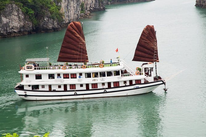 Mon Cheri Cruises 2 Days 1 Night - Cat Ba on day 2: sunrise Tai-chi, light breakfast, then the cave